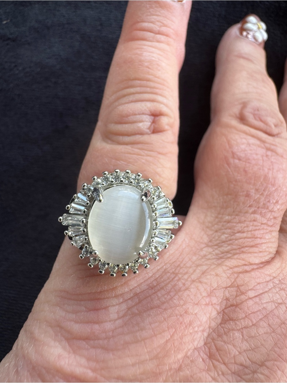 .925 Sterling Silver ring with large cabochon stone and CZ’s?  Size 8